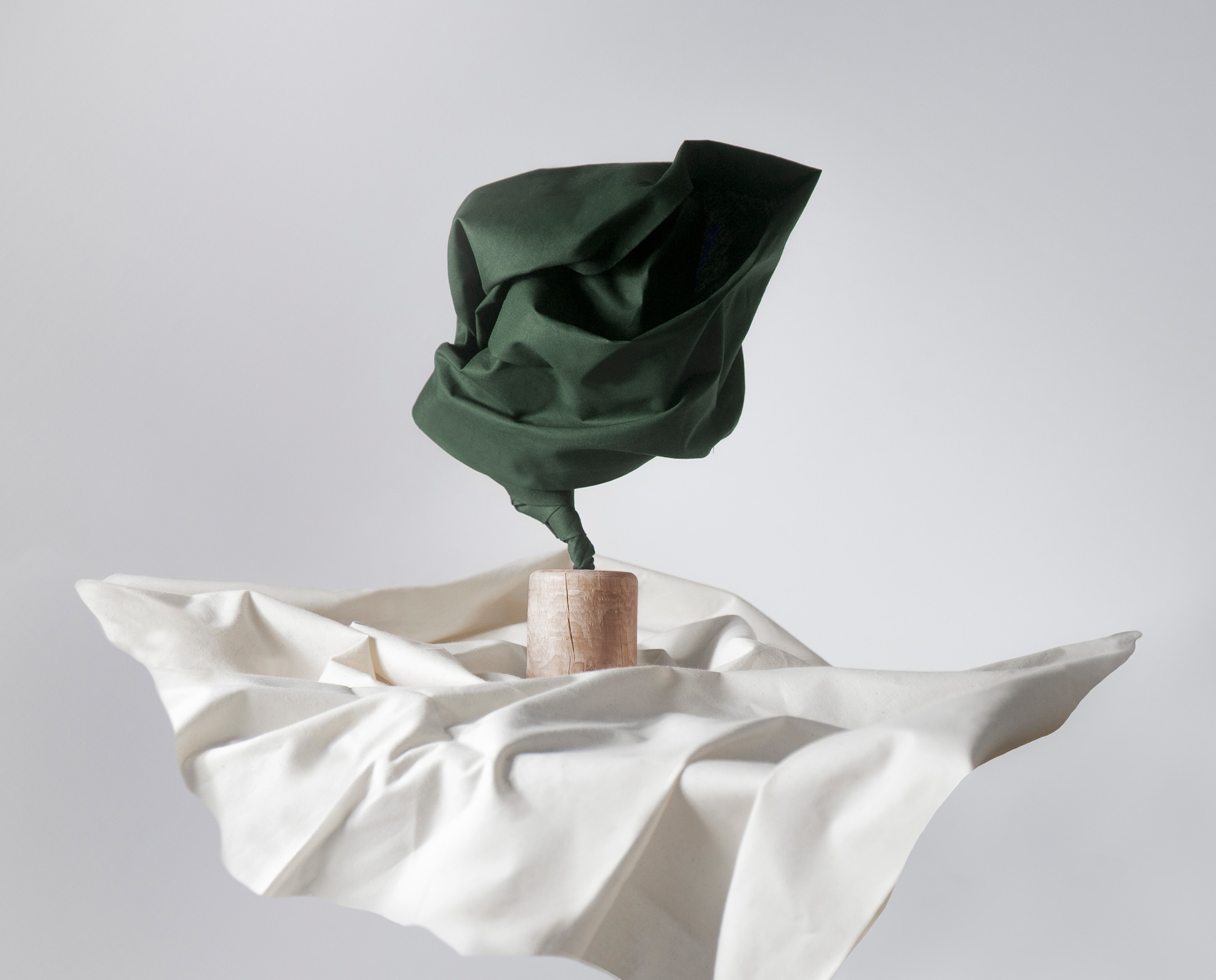 A green fabric trophy design by Kyle Wilkinson Studio