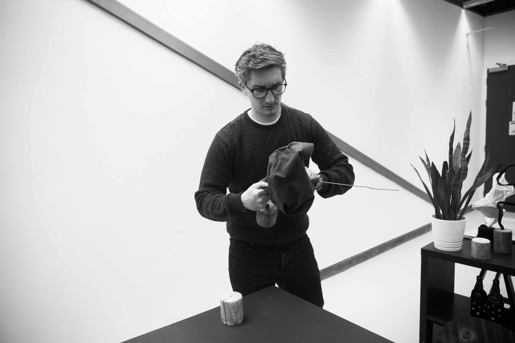 British designer, Kyle Wilkinson, designing a trophy made from wood and fabric for The European Commission